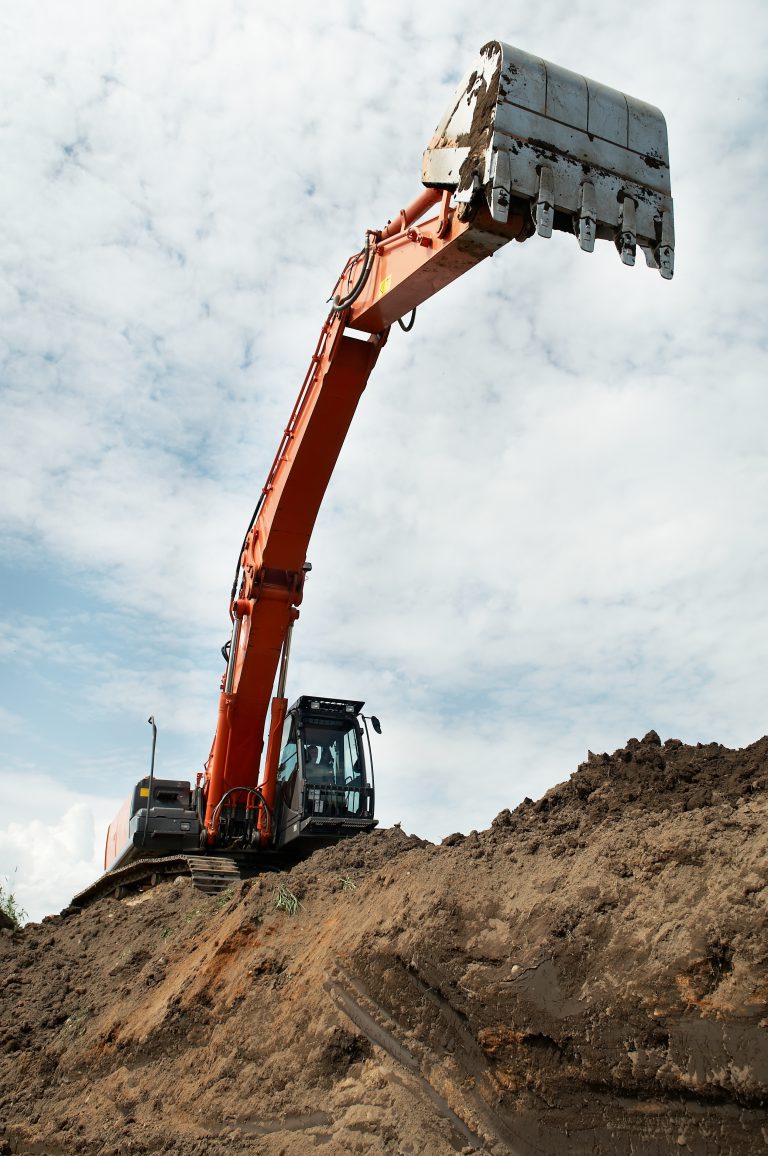 Deep digging at a basement excavation site.